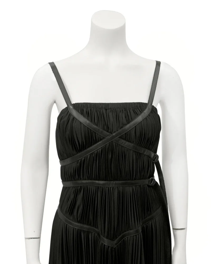 Black ruched dress with leather accents