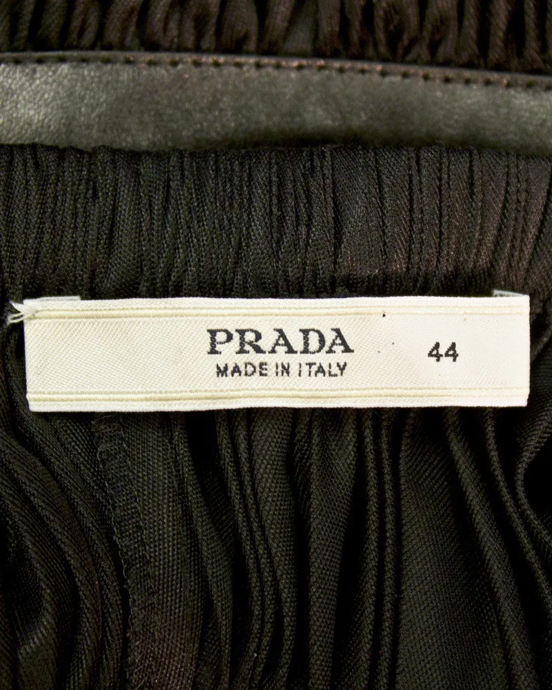 Black ruched dress with leather accents